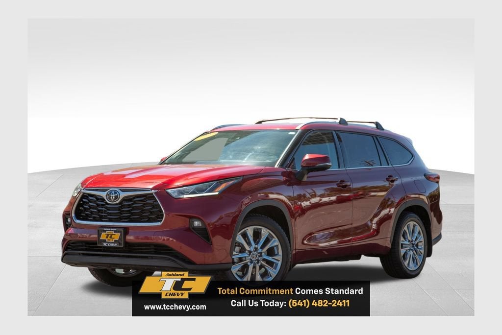2022 Toyota Highlander Limited in Red — front three-quarter view